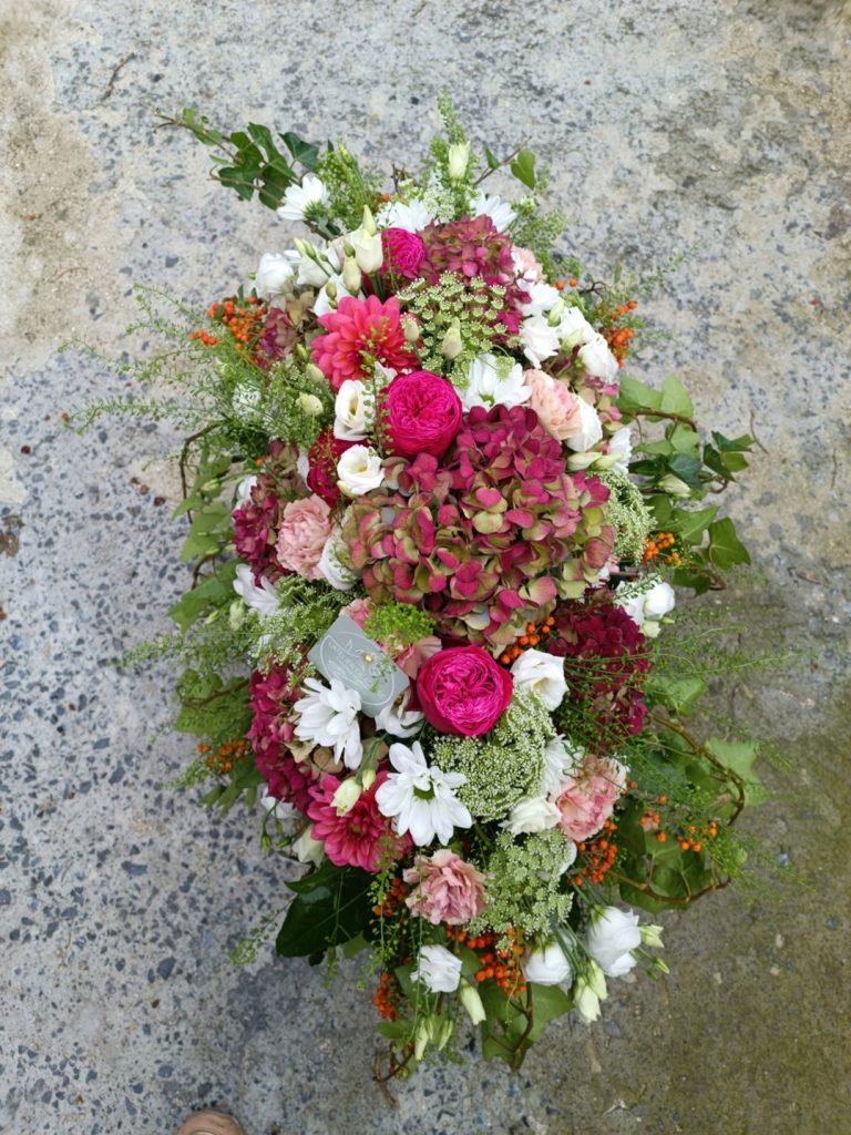 coussin floral oval pour deuil